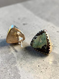 Making Waves Jewelry and Accessories triangle turquoise stud earrings in sterling silver with serrated bezel settings.