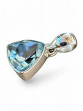 Making Waves Jewelry and Accessories trillion-cut blue topaz pendant in polished sterling silver setting