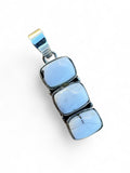Making Waves Jewelry and Accessories sterling silver pendant featuring three rectangular blue-white stone cabochons.