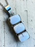 Making Waves Jewelry and Accessories triple stone pendant necklace with blue-white cabochons in 925 sterling silver.