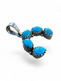 Making Waves Jewelry and Accessories sterling silver horseshoe pendant with five oval turquoise stones in serrated bezels