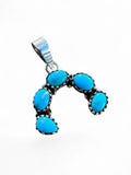Making Waves Jewelry and Accessories sterling silver horseshoe pendant with five oval turquoise stones in serrated bezels