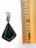 Making Waves Jewelry and Accessories sterling silver and turquoise celestial pendant measured against a wooden ruler