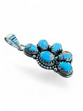 Making Waves Jewelry and Accessories turquoise cluster pendant in 925 sterling silver with artisan beadwork detail.