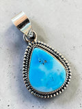 Making Waves Jewelry and Accessories teardrop turquoise pendant in 925 sterling silver with rope and bead detailing
