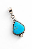 Making Waves Jewelry and Accessories teardrop turquoise pendant in 925 sterling silver with rope and bead detailing.