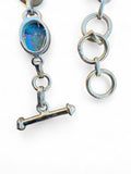 Making Waves Jewelry and Accessories sterling silver link bracelet with oval copper turquoise and toggle clasp