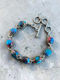 Making Waves Jewelry and Accessories oval copper turquoise link bracelet with sterling silver toggle clasp