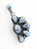 Making Waves Jewelry and Accessories sterling silver pendant with white buffalo turquoise stones in a cluster design