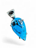 Making Waves Jewelry and Accessories handcrafted teardrop turquoise pendant in 925 sterling silver with dark gemstone