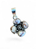 Making Waves Jewelry and Accessories sterling silver pendant with four teardrop white buffalo stones and floral detail.