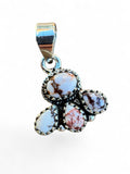 Making Waves Jewelry and Accessories sterling silver pendant featuring a floral cluster of white buffalo turquoise stones